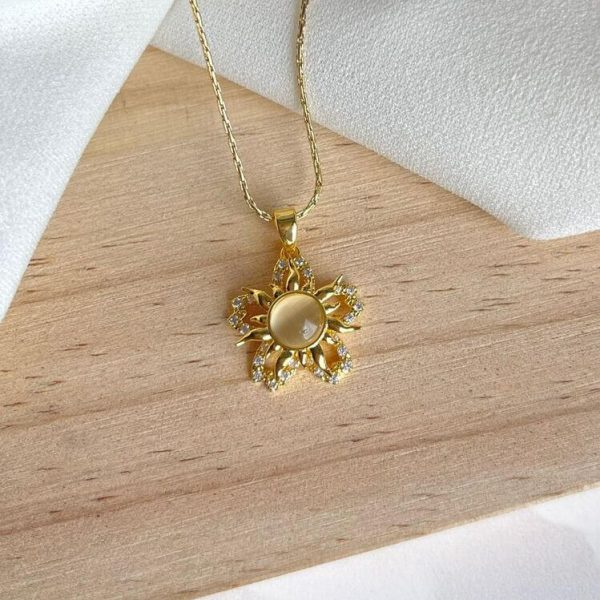 CADENA CON DIJE DE SOL GIRATORIO